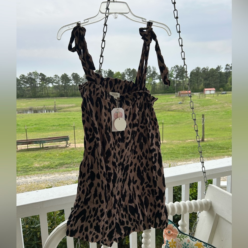 NEW WITH TAGS!!  ODDY “Wild Thing” Leopard Print Short Romper!  Size small.